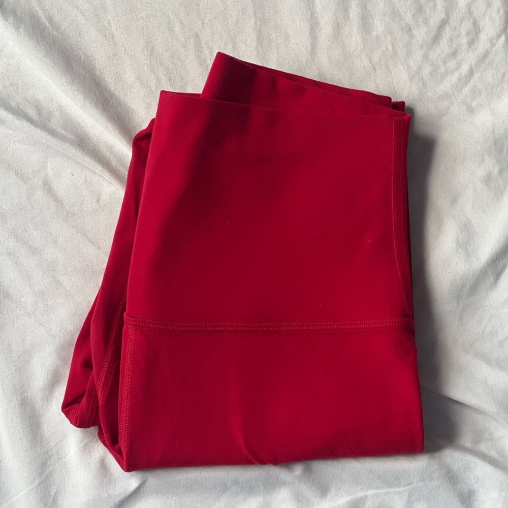 Red lululemon base pace high rise leggings 23”